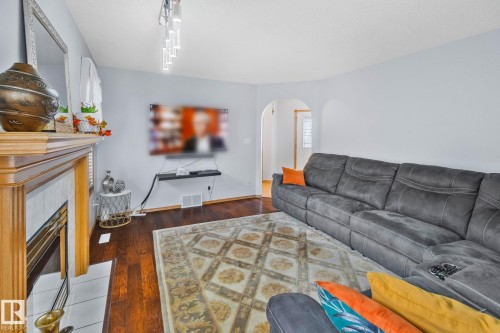 1238 Joyce Crescent Nw, Edmonton, AB - Indoor Photo Showing Living Room With Fireplace
