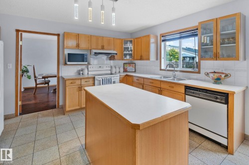 1238 Joyce Crescent Nw, Edmonton, AB - Indoor Photo Showing Kitchen With Double Sink