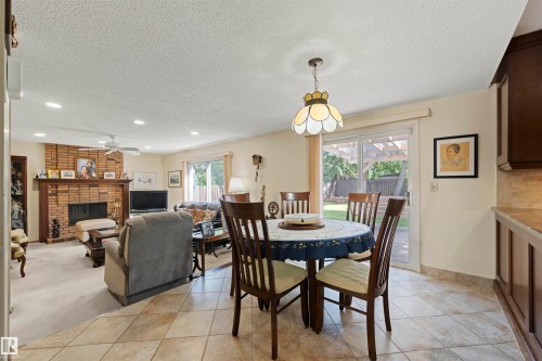 2811 125 Street, Edmonton, AB - Indoor Photo Showing Dining Room With Fireplace