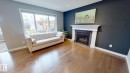 122 Sunterra Way, Sherwood Park, AB  - Indoor Photo Showing Living Room With Fireplace 