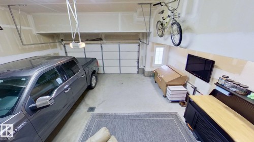 122 Sunterra Way, Sherwood Park, AB - Indoor Photo Showing Garage