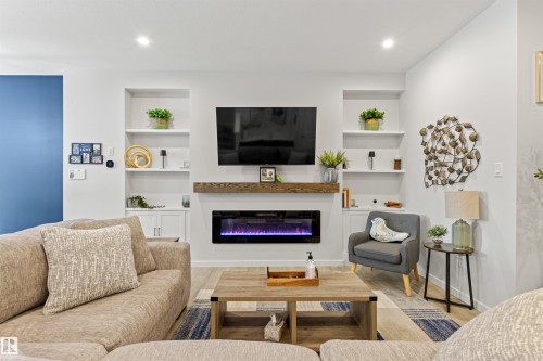 446 Roberts Crescent, Leduc, AB - Indoor Photo Showing Living Room With Fireplace