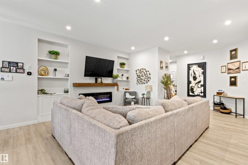 446 Roberts Crescent, Leduc, AB - Indoor Photo Showing Living Room With Fireplace