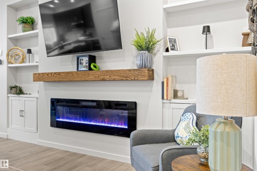 446 Roberts Crescent, Leduc, AB - Indoor Photo Showing Living Room With Fireplace