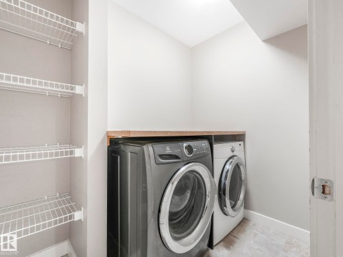 1004 Secord Promenade, Edmonton, AB - Indoor Photo Showing Laundry Room