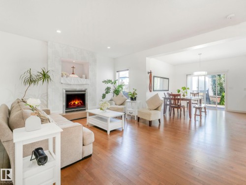 1004 Secord Promenade, Edmonton, AB - Indoor Photo Showing Living Room With Fireplace