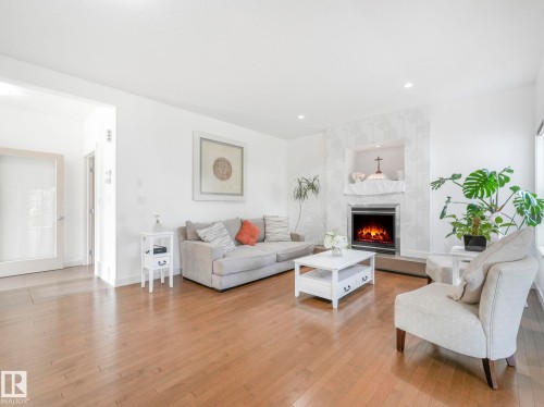 1004 Secord Promenade, Edmonton, AB - Indoor Photo Showing Living Room With Fireplace