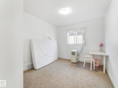1004 Secord Promenade, Edmonton, AB - Indoor Photo Showing Bedroom
