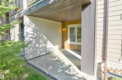 View of exterior entry with a patio area - 