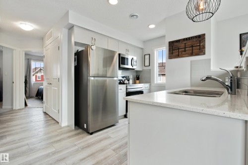 84 17832 78 Street, Edmonton, AB - Indoor Photo Showing Kitchen With Stainless Steel Kitchen With Double Sink