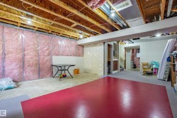 Unfinished below grade area featuring stairs - 