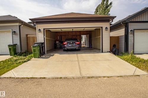 Garage featuring concrete driveway - 2407 Casey Link, Edmonton, AB - Outdoor