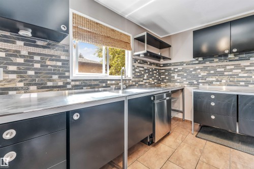 1303 37 Street, Edmonton, AB - Indoor Photo Showing Kitchen With Stainless Steel Kitchen With Double Sink