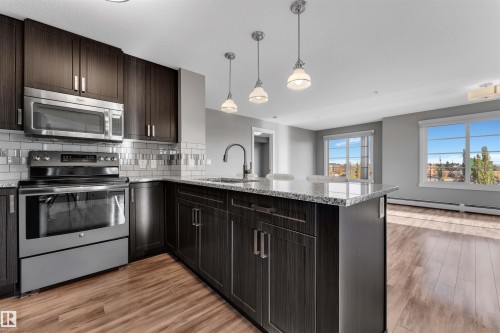 319 3670 139 Avenue, Edmonton, AB - Indoor Photo Showing Kitchen With Upgraded Kitchen