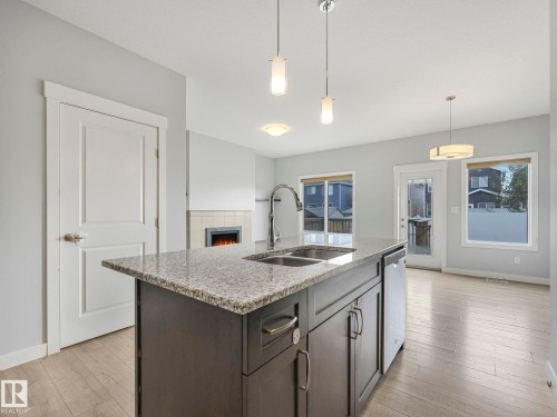 557 Sturtz Link, Leduc, AB - Indoor Photo Showing Kitchen With Double Sink