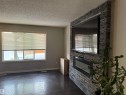 6007 5 Avenue, Edmonton, AB  - Indoor With Fireplace 