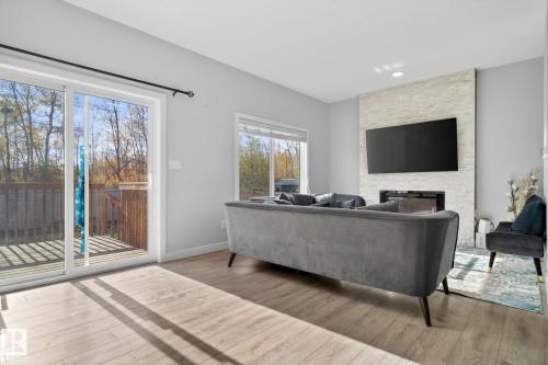 267 39 Ave, Edmonton, AB - Indoor Photo Showing Living Room With Fireplace