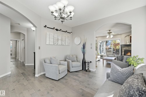2311 Bailey Court, Edmonton, AB - Indoor Photo Showing Living Room With Fireplace