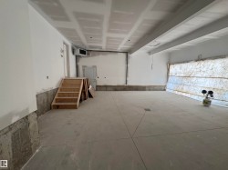 Garage featuring a heating unit - 