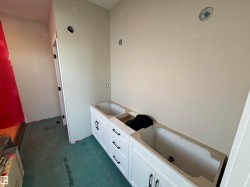 Full bath featuring a bath and vanity - 