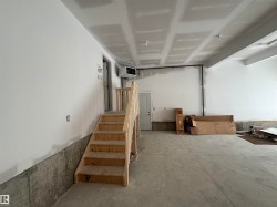 Below grade area featuring a heating unit - 