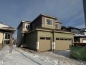 View of front of property with an attached garage - 28 Harley Way, Spruce Grove, AB  - Outdoor With Facade 