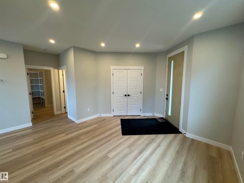 Entryway with recessed lighting and light wood-style flooring - 28 Harley Way, Spruce Grove, AB - Indoor Photo Showing Other Room