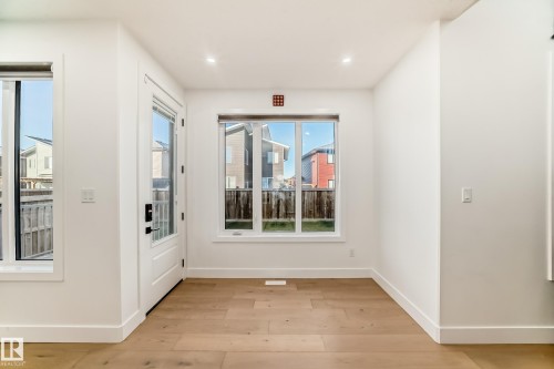 Doorway featuring hardwood / wood-style floors and recessed lighting - 42 Elwyck Gate, Spruce Grove, AB - Indoor Photo Showing Other Room