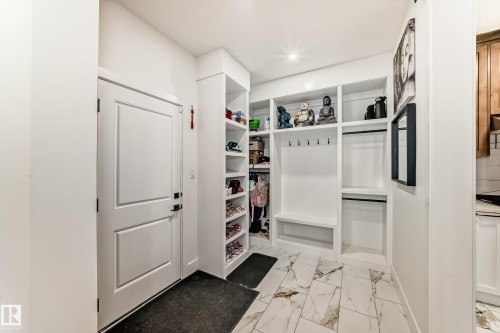 Mudroom featuring light marble finish flooring - 42 Elwyck Gate, Spruce Grove, AB - Indoor Photo Showing Other Room
