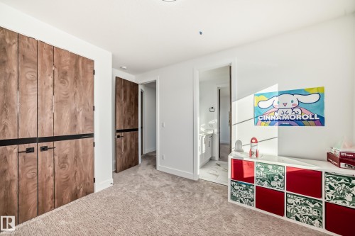 Bedroom featuring a closet, carpet, and ensuite bath - 42 Elwyck Gate, Spruce Grove, AB - Indoor Photo Showing Other Room