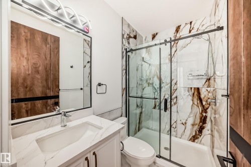 Bathroom featuring vanity and a marble finish shower - 42 Elwyck Gate, Spruce Grove, AB - Indoor Photo Showing Bathroom