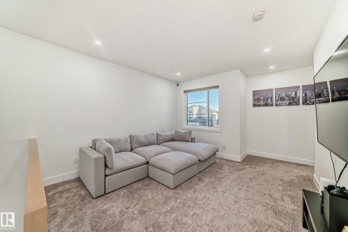 Living area with light colored carpet and recessed lighting - 42 Elwyck Gate, Spruce Grove, AB - Indoor