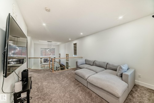 Carpeted living room featuring recessed lighting - 42 Elwyck Gate, Spruce Grove, AB - Indoor