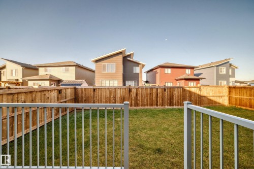 Fenced backyard featuring a residential view - 42 Elwyck Gate, Spruce Grove, AB - Outdoor