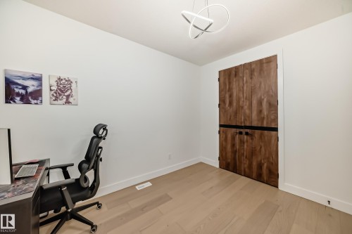 Office space featuring light wood-style flooring and baseboards - 42 Elwyck Gate, Spruce Grove, AB - Indoor Photo Showing Office