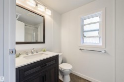 Full bathroom featuring vanity and a shower - 