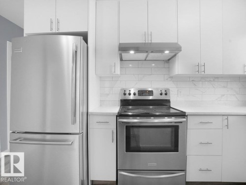 9815 159 Street Nw, Edmonton, AB - Indoor Photo Showing Kitchen With Upgraded Kitchen