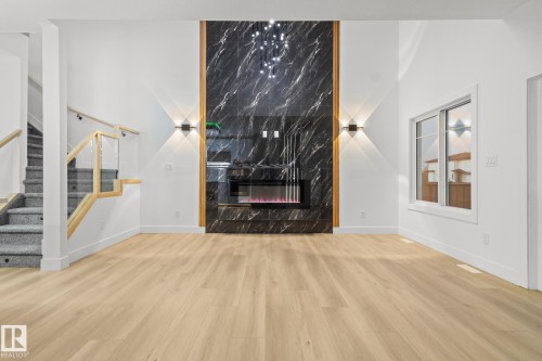 15417 20 Street, Edmonton, AB - Indoor Photo Showing Living Room With Fireplace