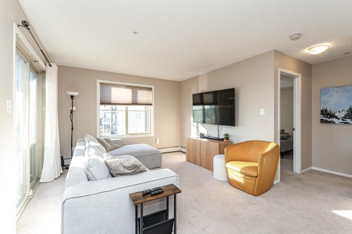 321 1070 Mcconachie Boulevard, Edmonton, AB - Indoor Photo Showing Living Room
