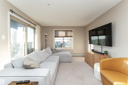 321 1070 Mcconachie Boulevard, Edmonton, AB - Indoor Photo Showing Living Room