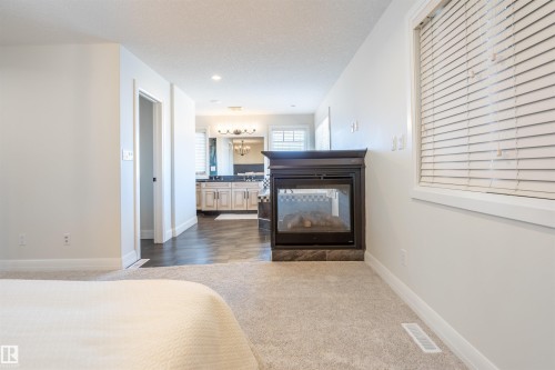 20 10550 Ellerslie Road, Edmonton, AB - Indoor With Fireplace