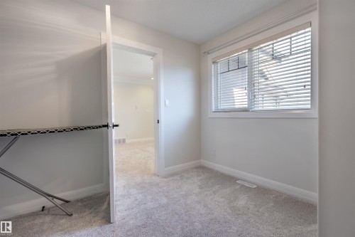 20 10550 Ellerslie Road, Edmonton, AB - Indoor Photo Showing Other Room