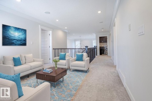 20 10550 Ellerslie Road, Edmonton, AB - Indoor Photo Showing Living Room
