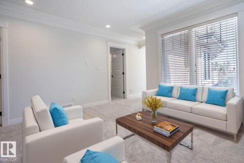 20 10550 Ellerslie Road, Edmonton, AB - Indoor Photo Showing Living Room