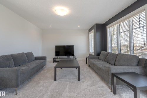 20 10550 Ellerslie Road, Edmonton, AB - Indoor Photo Showing Living Room