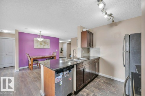 201 111 Watt Common, Edmonton, AB - Indoor Photo Showing Kitchen With Double Sink