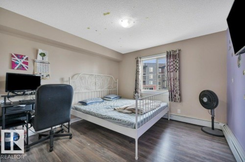 201 111 Watt Common, Edmonton, AB - Indoor Photo Showing Bedroom