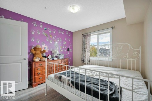 201 111 Watt Common, Edmonton, AB - Indoor Photo Showing Bedroom