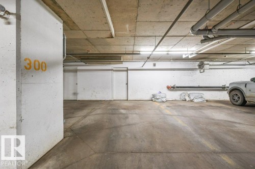 201 111 Watt Common, Edmonton, AB - Indoor Photo Showing Garage
