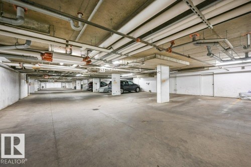 201 111 Watt Common, Edmonton, AB - Indoor Photo Showing Garage
